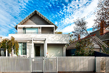 Modern picket fence with automatic sliding gate